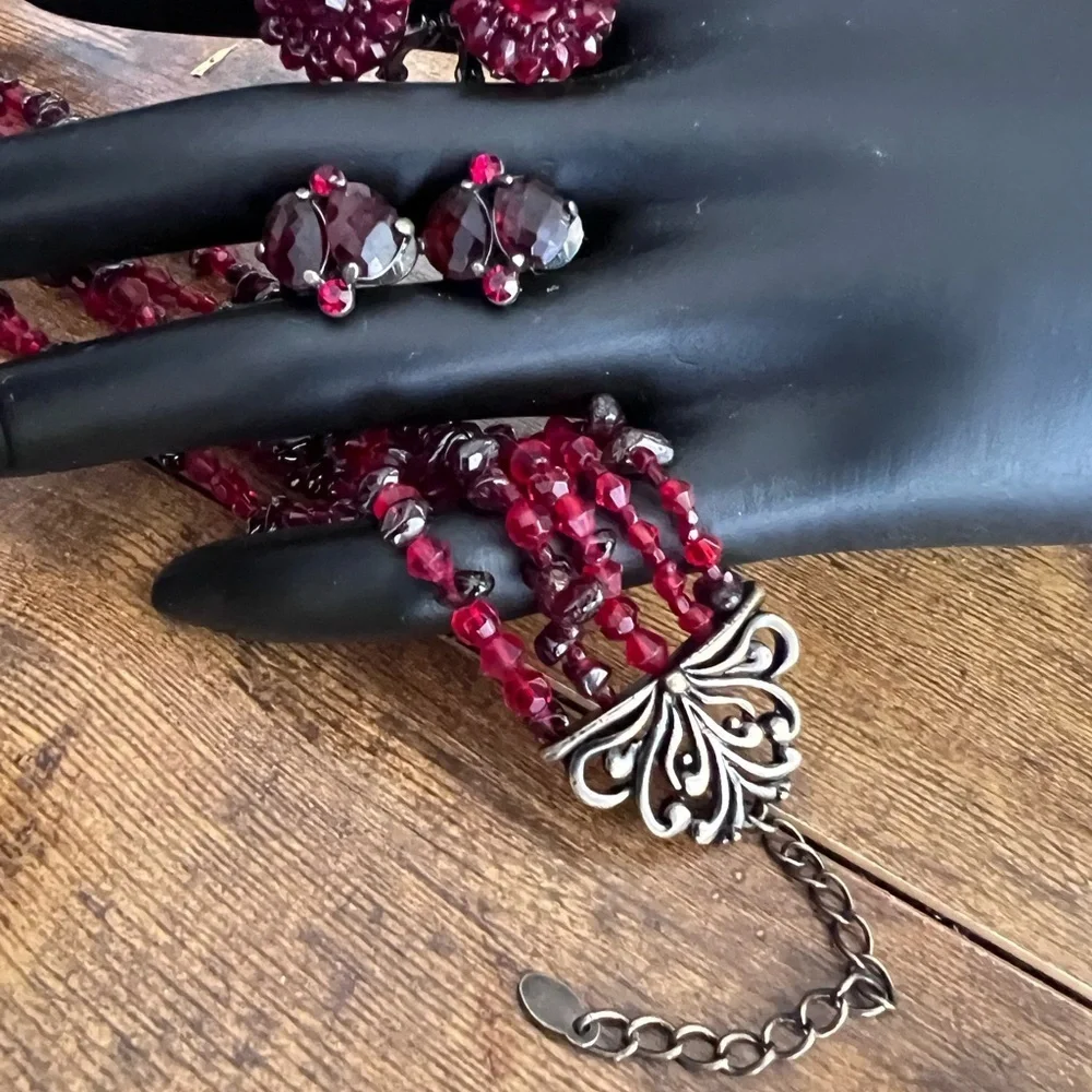 Vintage Garnet set. 2 pairs of clip on earrings and a necklace that matches.